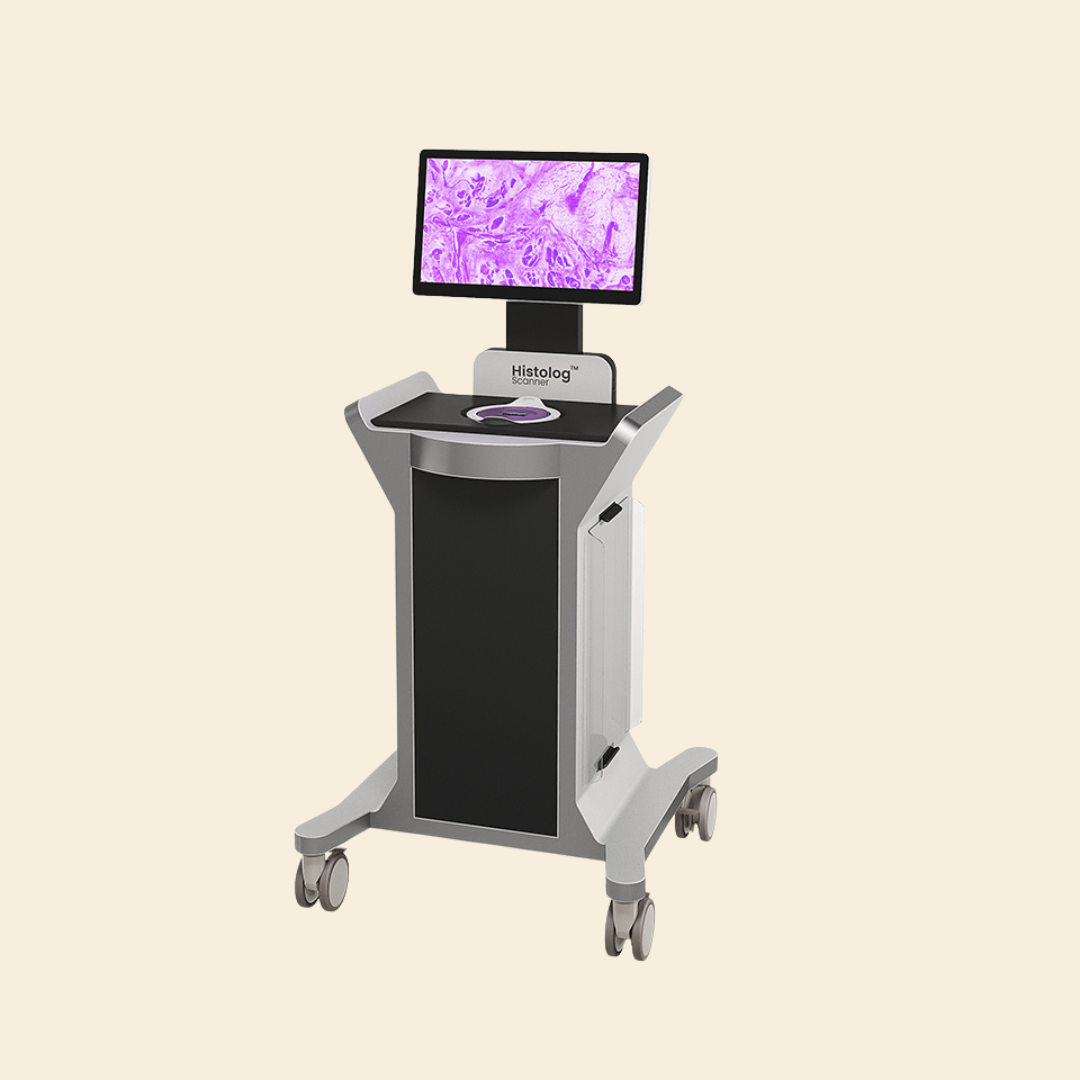 Kolica s uređajem za histologiju s postavljenim monitorom koji prikazuje mikroskopski uzorak u ljubičastim nijansama.